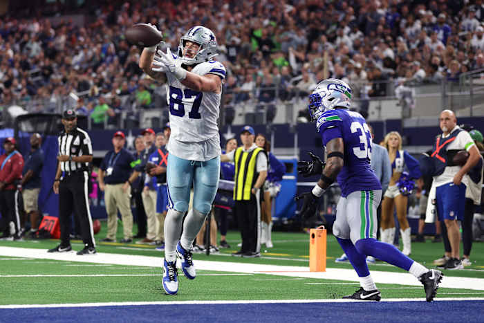 Nov 30, 2023; Arlington, Texas, USA; Dallas Cowboys tight end Jake Ferguson (87) catches a pass for a touchdown during the second half against the Seattle Seahawks at AT&T Stadium. Mandatory Credit: Tim Heitman-USA TODAY Sports